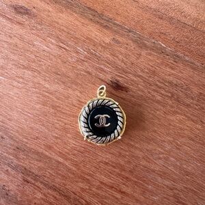 CHANEL Black and Gold Brooch Timeless Elegance